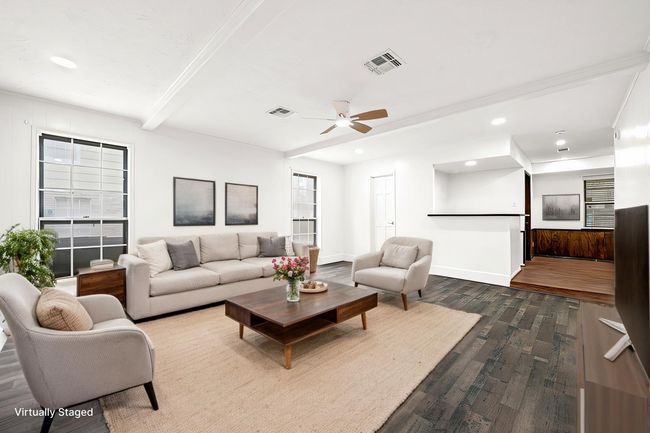 Virtually Staged: Formal living with a dry bar off the back and access to the formal dining room. | Image 9