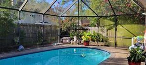 235 Rustic Oaks Dr, League City, TX, 77573-1775 | Card Image