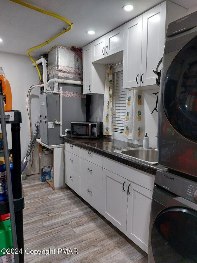 Laundry Area Kitchenette | Image 31