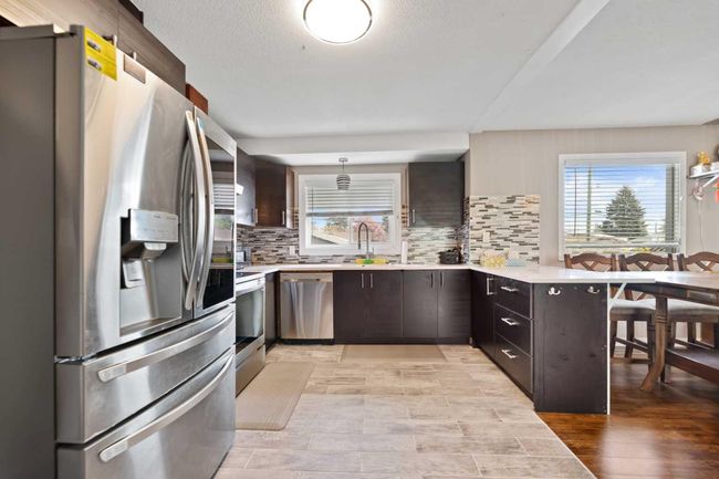 83 Penmeadows Place Se, House other with 4 bedrooms, 2 bathrooms and 2 parking in Calgary AB | Image 11