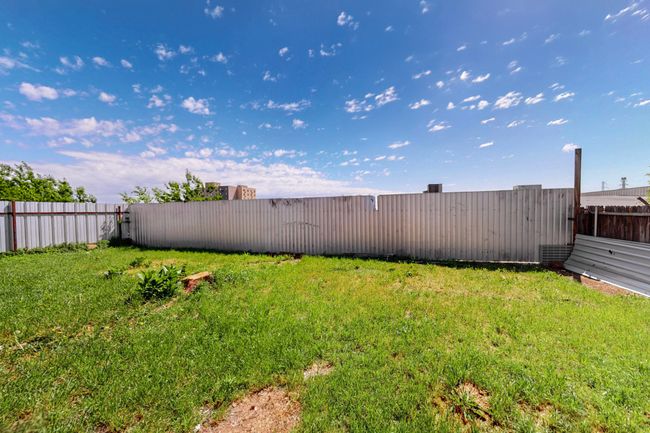 View of yard with a fenced backyard | Image 36