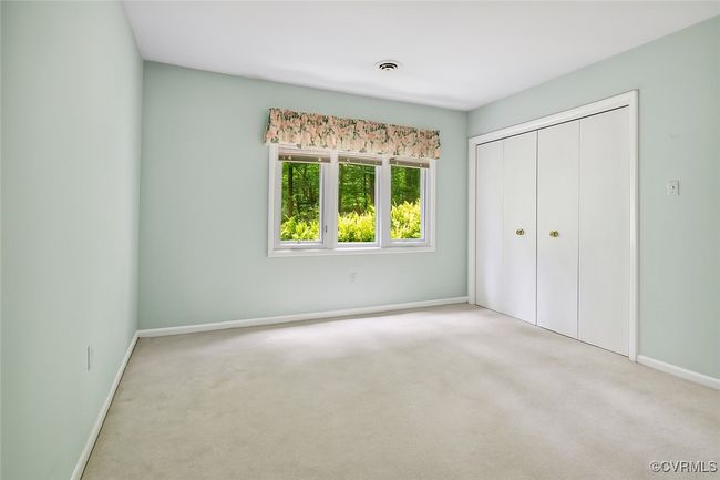 Unfurnished bedroom featuring carpet and a closet | Image 21