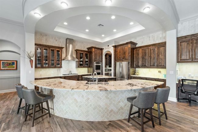 The kitchen is packed with features, making entertaining as easy as daily life. | Image 13
