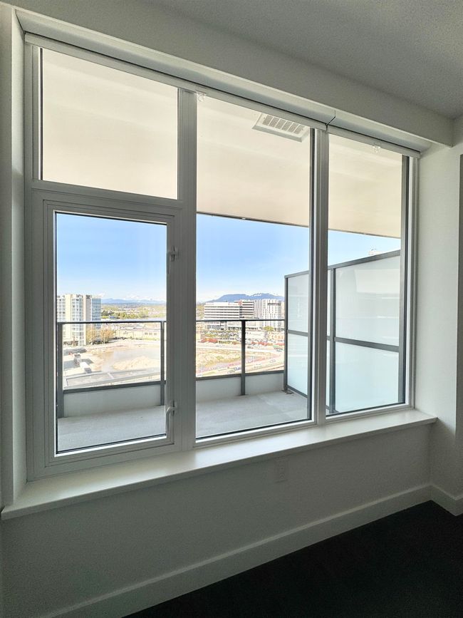 Unfurnished room featuring visible vents | Image 13