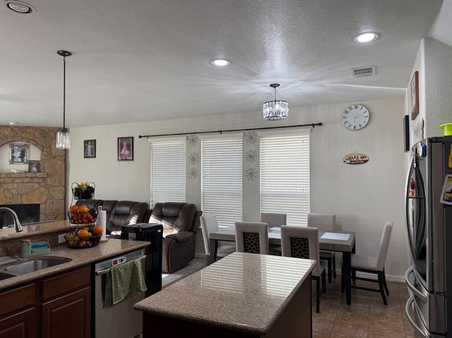 View of kitchen, dining with great space to enjoy all year. | Image 24