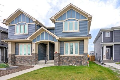 65 River Heights Dr, Home with 4 bedrooms, 3 bathrooms and 2 parking in Cochrane AB | Image 1