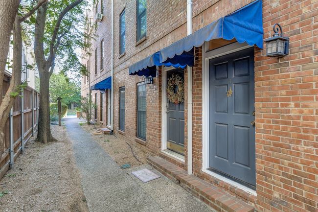 Awnings cover the front doors | Image 24