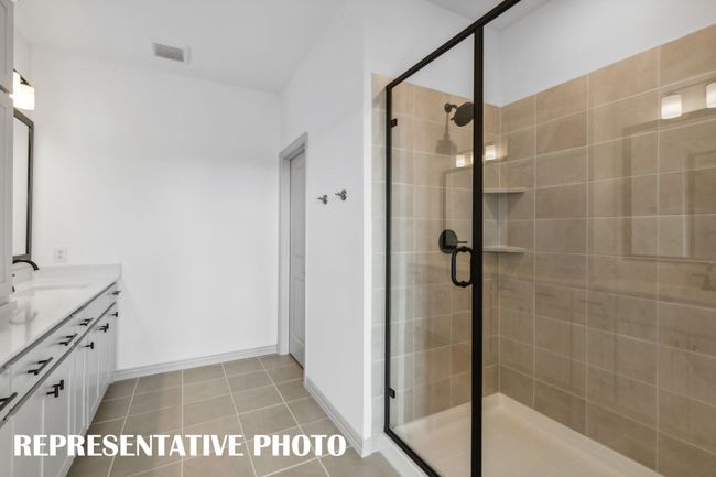 This oversized owner's shower is a dream come true! REPRESENTATIVE PHOTO | Image 12