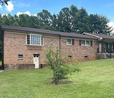 Back of house with a yard | Image 1