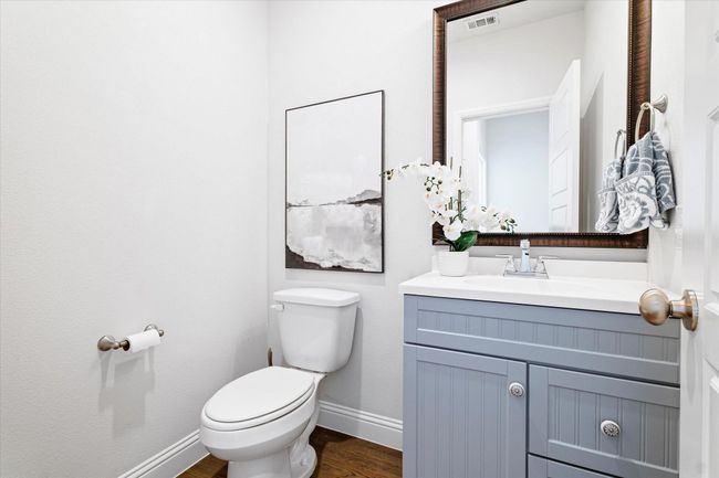 Bathroom with vanity and wood finished floors | Image 23
