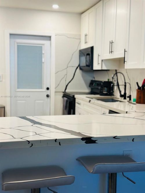 f-1002 Ne 119th St, Biscayne Park, FL, 33161-6446 | Card Image