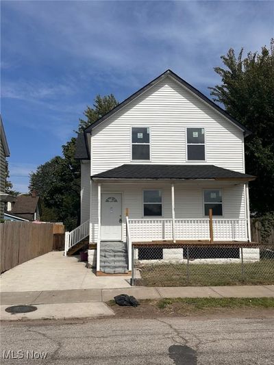 View of front of property with covered porch | Image 1