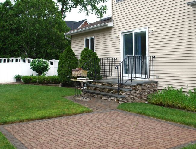 View of yard featuring a patio area | Image 40