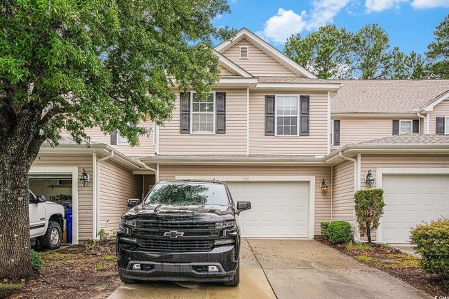 Multi unit property with driveway and an attached garage | Image 21