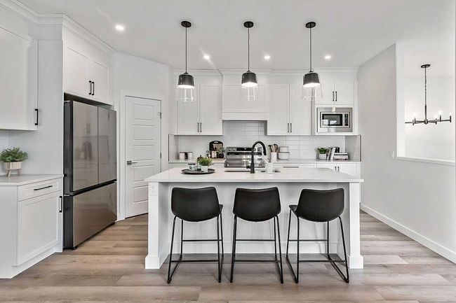 48 Drake Landing Square, Home with 4 bedrooms, 3 bathrooms and 2 parking in Okotoks AB | Image 11