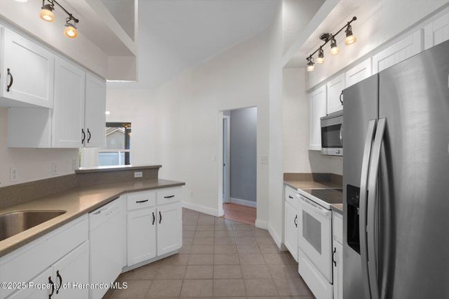 10101 Langan St, House other with 3 bedrooms, 2 bathrooms and null parking in Spring Hill FL | Image 17