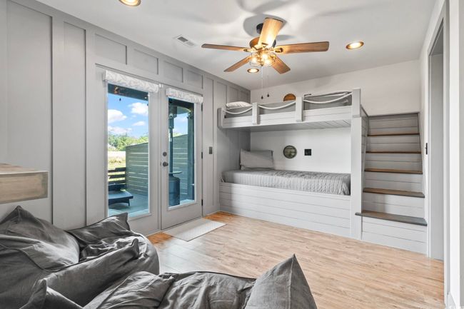 Interior space featuring recessed lighting, wood finished floors, visible vents, access to exterior, and french doors | Image 23