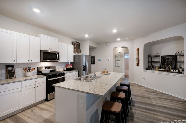 MODEL HOME PHOTOGRAPHED FLOOR PLAN IS AVAILABLE. | Image 11