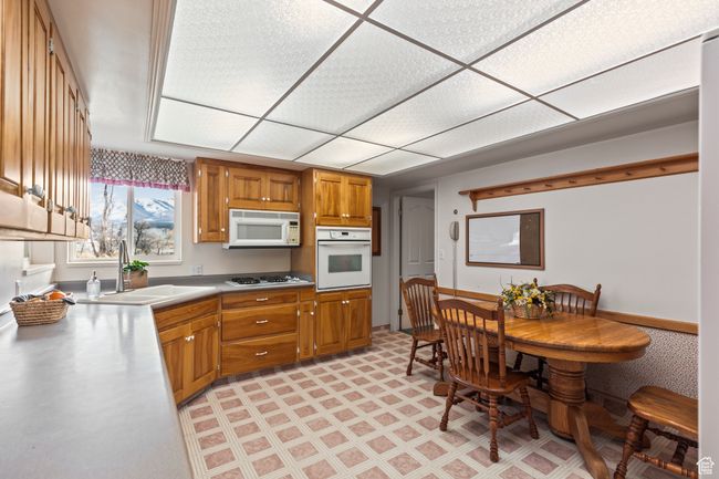 kitchen and sink window to the backyard | Image 8