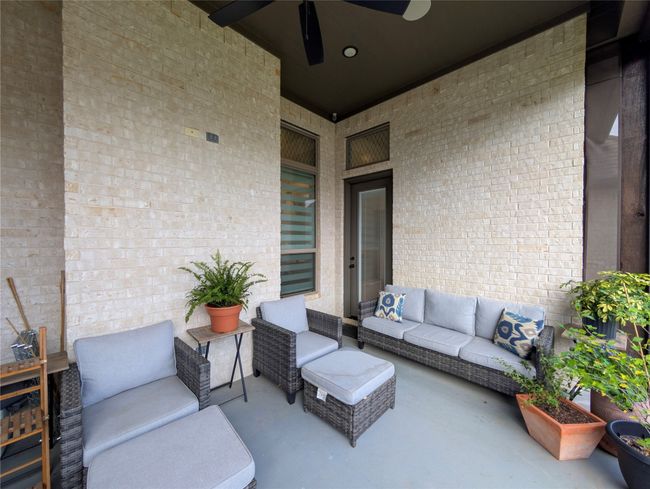 View of patio / terrace featuring an outdoor hangout area and a ceiling fan | Image 35