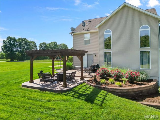 Back of property featuring a pergola, patio area | Image 38