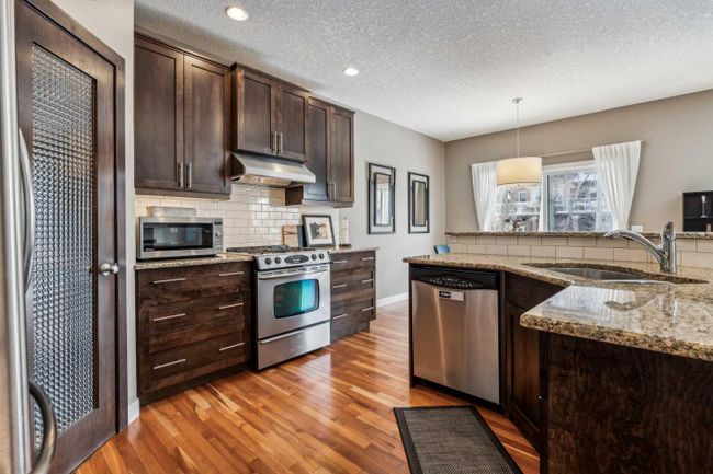 67 Tremblant Way Sw, Home with 3 bedrooms, 2 bathrooms and 2 parking in Calgary AB | Image 4