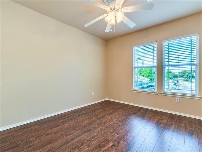 One of two perfectly sized secondary bedrooms upstairs. | Image 18
