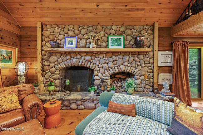 Custom River rock fireplace | Image 24