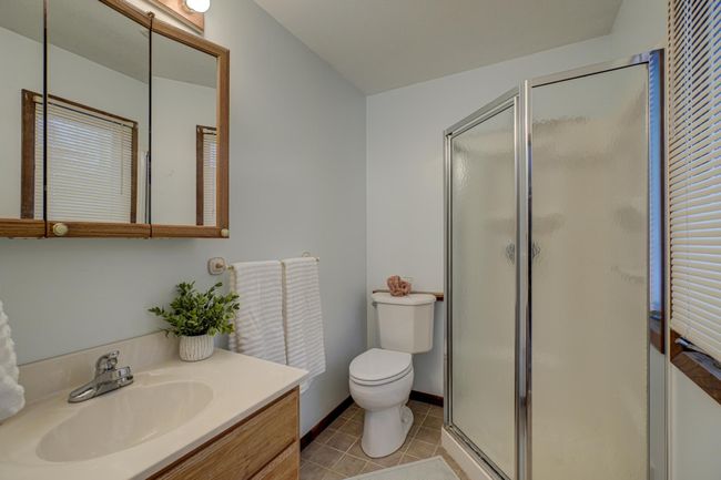 Enjoy the convenience and privacy of your own spacious primary 3/4 bath—perfect for unwinding in peace | Image 19