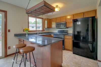 Kitchen w/breakfast bar | Image 2