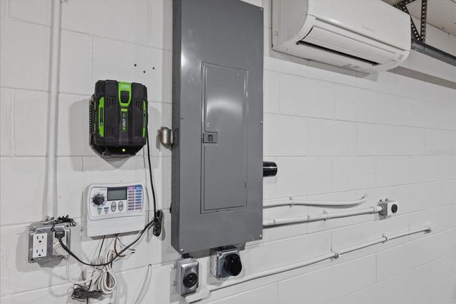 Multi-purpose garage! New 220 electric panel EV / RV ready, new split unit & insulated. This could be a fourth bedroom or a game room! | Image 25