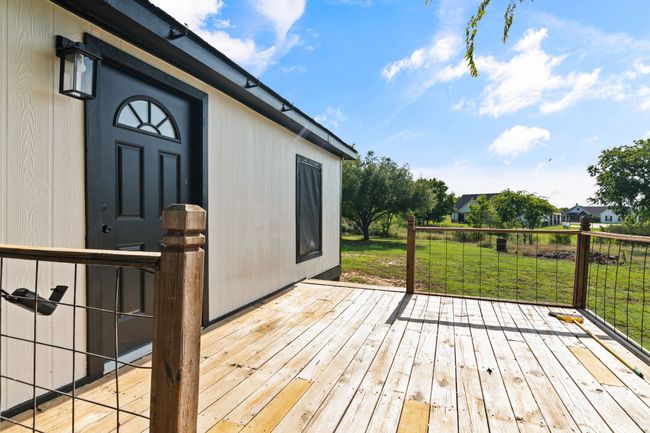 Wooden deck with a yard | Image 12