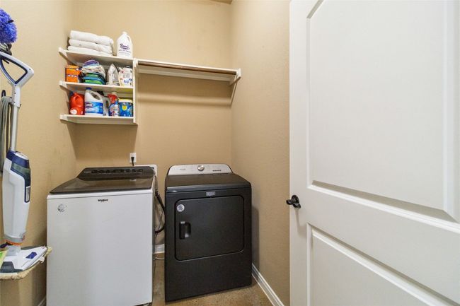 Washroom with separate washer and dryer and baseboards | Image 20