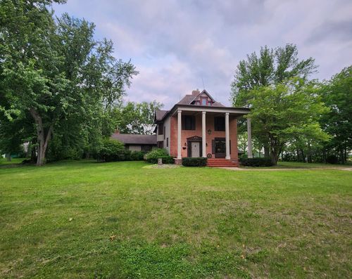 1315 W Fairview Ave, Olivia, MN, 56277-1238 | Card Image