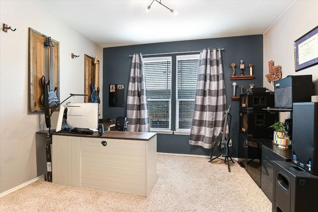 Office space with carpet flooring and baseboards | Image 17