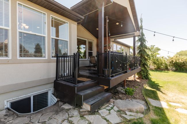 Wooden deck with a lawn | Image 45