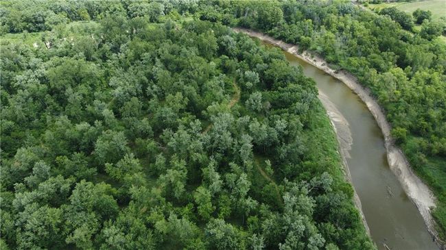 Aerial overview of property's location featuring a large body of water | Image 59