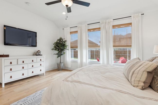 Another view of primary bedroom | Image 13
