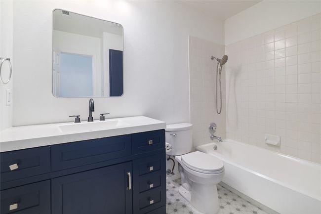 Second full bathroom that ties in design from the rest of the home. | Image 25