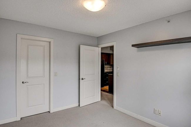 412 - 201 Sunset Dr, Condo with 1 bedrooms, 1 bathrooms and 2 parking in Cochrane AB | Image 8