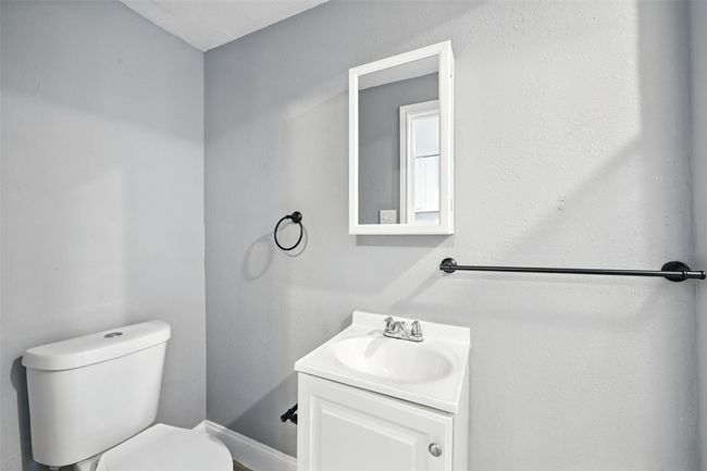Bathroom with vanity and toilet | Image 16