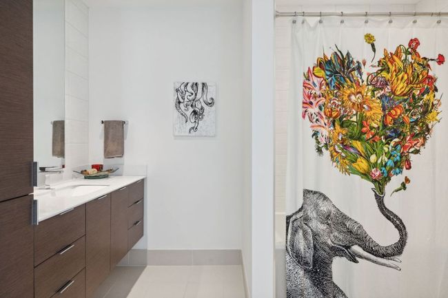 Bathroom featuring vanity, tile patterned floors, and a shower with shower curtain | Image 27