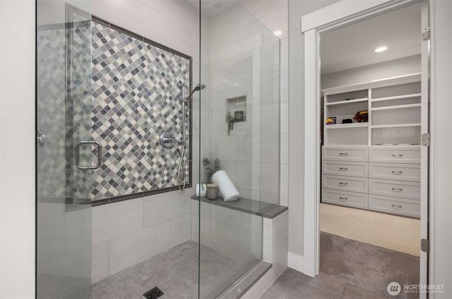 Enjoy the shower head or the rain shower as you relax in this spa like setting. | Image 21