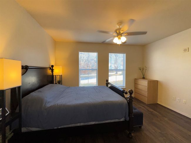 Bedroom featuring dark hardwood / wood-style floors and ceiling fan | Image 10