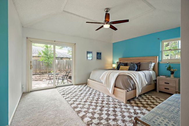 Spacious primary suite with high ceilings and private patio access | Image 20