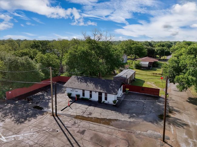 Birds eye view of property with a wooded view | Image 20