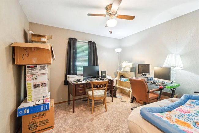 Office space featuring ceiling fan and carpet flooring | Image 30