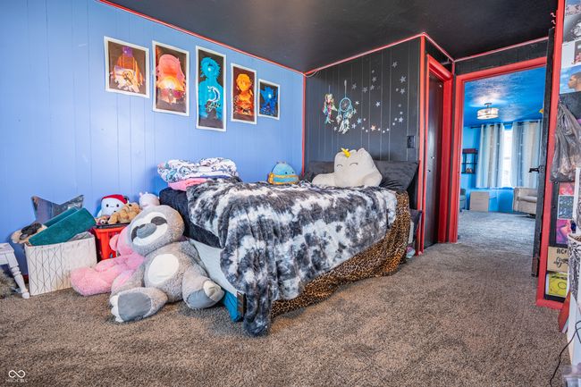 bedroom with carpet floors | Image 21