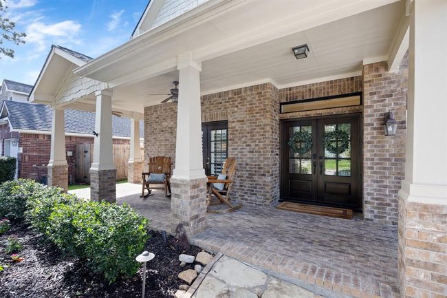 Owners added these gorgeous double doors to create the perfect entry combined with the front porch. | Image 4