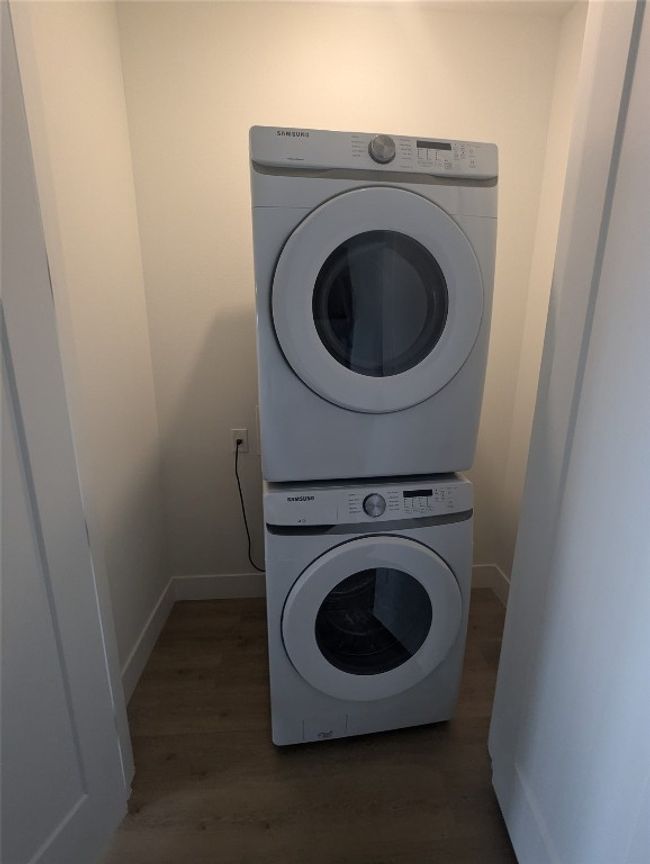 stacked washer and dryer within the unit | Image 14